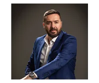 Professional real estate and construction consultant portrait.