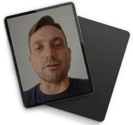Tablet mockup showing real estate mentor video.